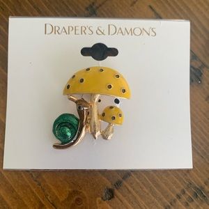 Draper’s & Damon’s Brooch Pin.